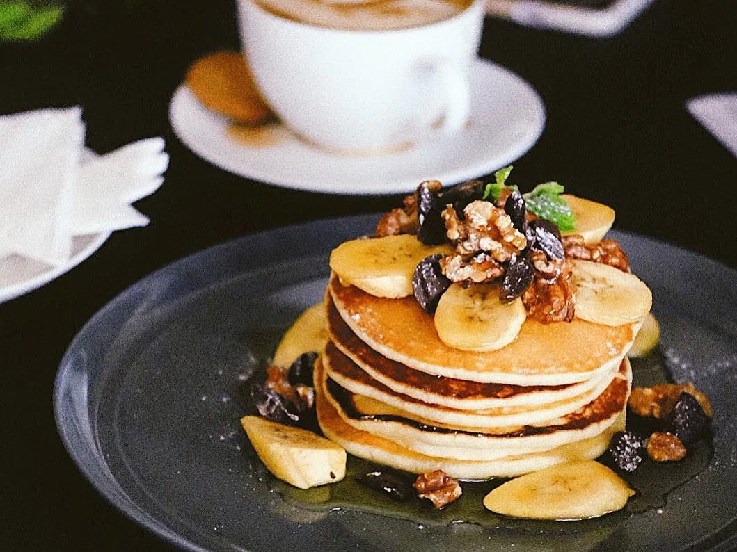 Pancakes and coffee served as part of The Bourke Hotel guest experience.