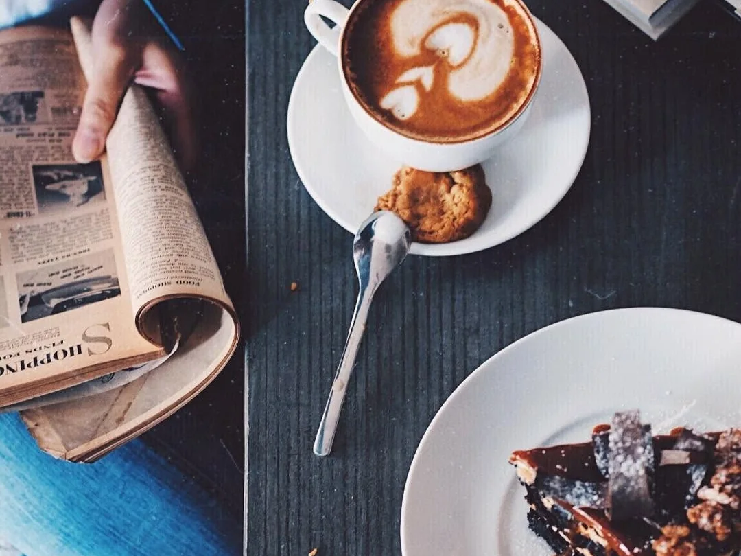 Coffee and newspaper details from The Bourke Hotel guest service.